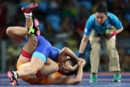 RIO DE JANEIRO, BRAZIL - AUGUST 17: Sakshi Malik (R) of India competes against Valeriia Koblova Zholobova of Russia during a Women's Freestyle 58kg Quarterfinal bout on Day 12 of the Rio 2016 Olympic Games at Caioca Arena 2 on August 17, 2016 in Rio de Janeiro, Brazil. (Photo by Lars Baron/Getty Images)